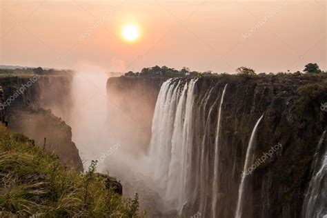 Victoria Falls sunset — Stock Photo © Saaaaa #36162329