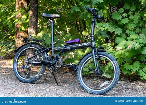 Zizzo Folding Bike with Bike Lock on a Late Summer Day Editorial Photography - Image of ...