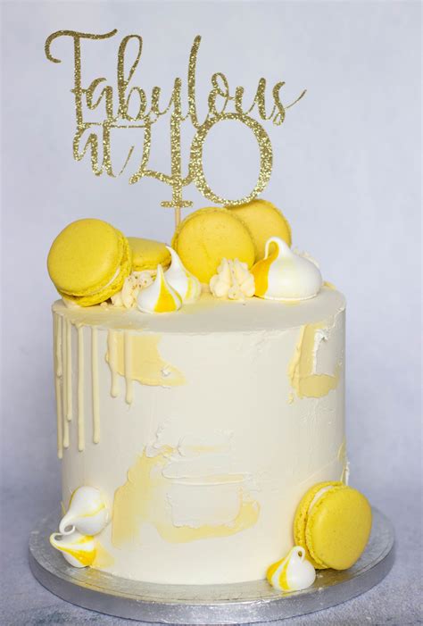 textured lemon drip cake. Lemon macarons. 40th birthday cake | Lemon birthday cakes, Drip cakes ...