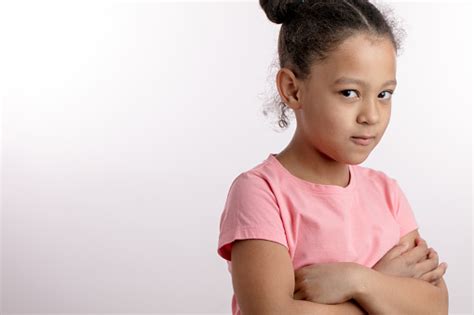 Upset Beautiful Girl Standing With Crossed Arms Blackhaired Kid Is Resenting Parents Stock Photo ...