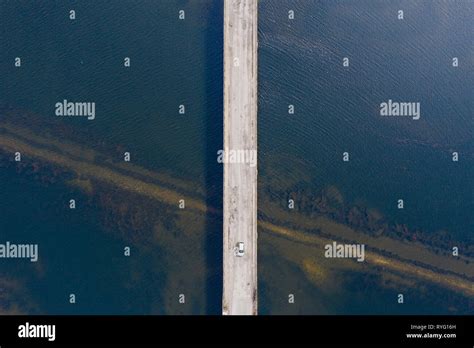 Aerial view of a bridge crossing the sea from a drone Stock Photo - Alamy