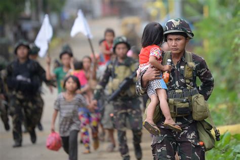 Marawi crisis over before martial law ends: Año | ABS-CBN News