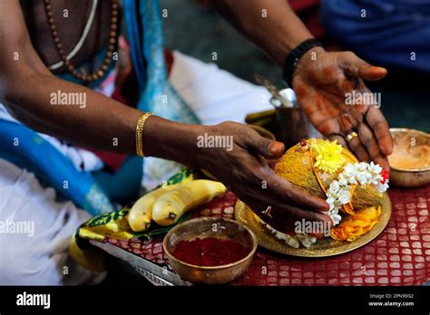 Sri Krishnan hindu temple. Hindu priest ( Brahmin ) performing puja ...