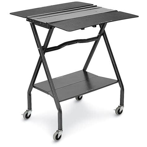 a small black table with wheels and a tray on the top that holds a laptop