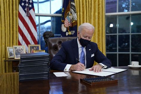 Biden signs executive orders, targets Trump’s legacy on first day in ...