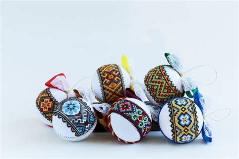 an assortment of decorative ornaments are displayed on a white surface ...