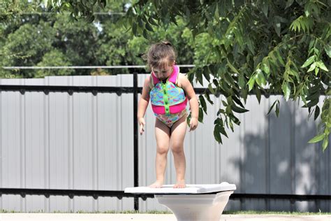 Little Girl On Diving Board Free Stock Photo - Public Domain Pictures