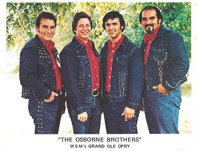 SIGNED, PROFESSIONAL PHOTOGRAPH OF THE OSBORNE BROTHERS (BOBBY, SONNY & ROBBY) AND DALE SLEDD ...