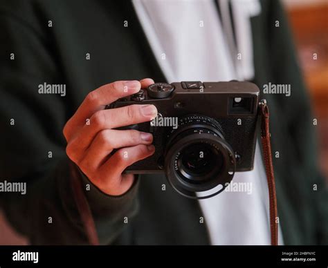 Photographer with Vintage Camera Stock Photo - Alamy