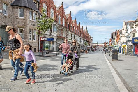 People Walking Through Town Centre In Colwyn Bay Stock Photo - Download Image Now - Wales, Town ...