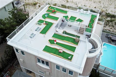 Psychology professor puts sweet mini-golf course on the roof of her holiday house - Australian ...