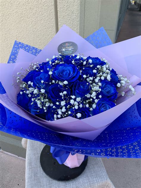 2 Dz. Blue Roses Wrapped Bouquet (PRE-ORDER ONLY) by La Floriya