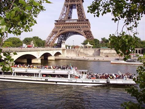 Bateau Mouche on river Seine near the Pont d'Iéna and Eiffel Tower in Paris, France Paris Travel ...