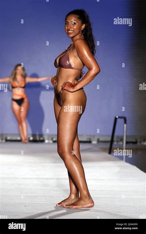 MIAMI BEACH, FLORIDA - JULY 16: Manju Bangalore walks the runway for ...