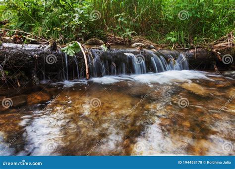 A Small Waterfall on a Mountain River with Crystal Clear Water Stock ...