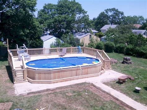 25 Top Oval Above Ground Swimming Pools Design with Decks | Swimming ...