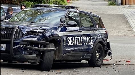 Seattle police cars damaged by driver trying to escape arrest | king5.com