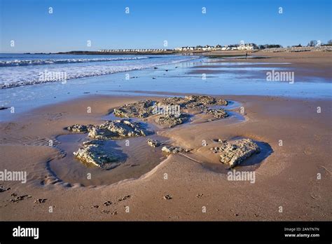 Newton Beach near Porthcawl, South Wales with the Trecco Bay caravan park in the distance Stock ...