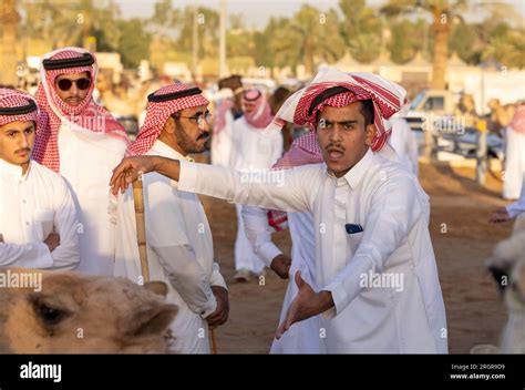 Buraydah, Saudi Arabia, 4th August 2023: saudi men at a camel market Stock Photo - Alamy