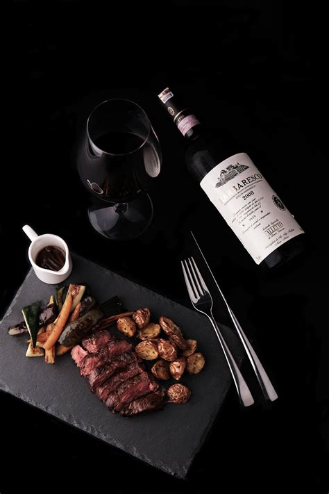 Red Wine Bottle and Red Wine in Glass with a steak dinner. A very fine dining setup. | Steak ...