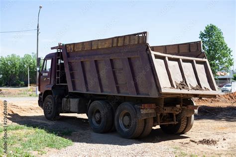 Dump truck At the construction site. Vehicles for the transport of materials. Stock Photo ...