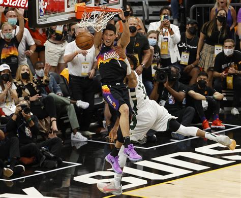 NBA Finals: Suns star Devin Booker dunks on Giannis