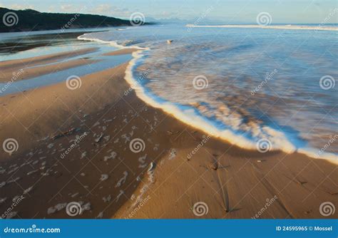 River Flowing Into Sea Royalty Free Stock Photo - Image: 24595965