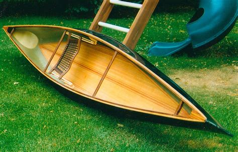 Wood solo canoe with carbon fiber skin Canoe Camping, Canoe And Kayak, Lounge Chair Outdoor ...