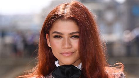 Zendaya goes red head to honor MJ on Spider-Man press tour