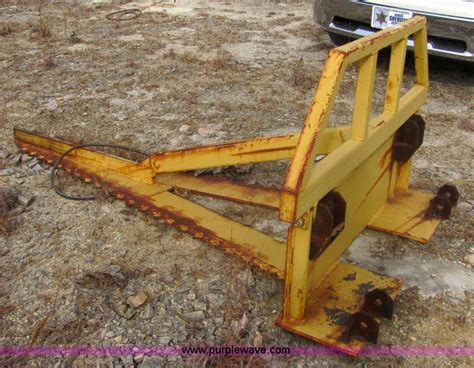 Rigid tree saw skid steer attachment in Winfield, KS | Item 6656 sold ...