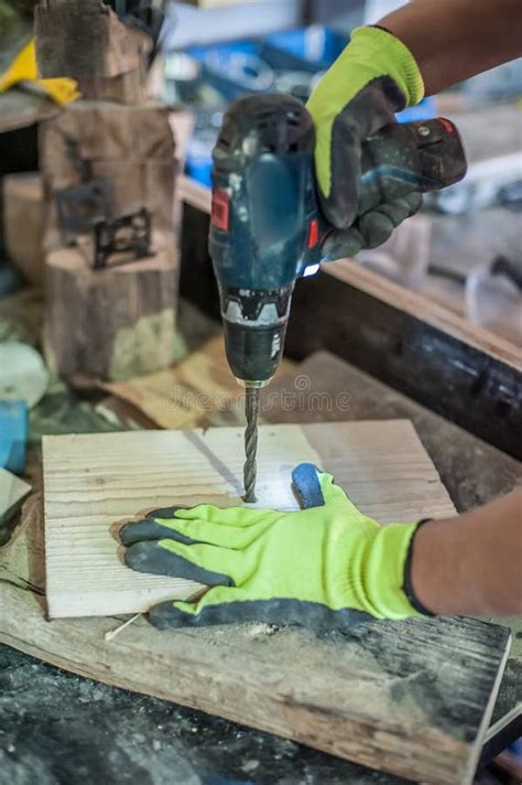 Female Carpenter Using Power Drill Stock Photo - Image of fixing, people: 67588486