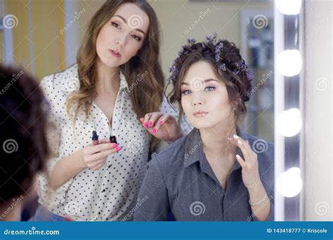 Stylist Makeup Artist Doing Makeup and Hair in a Beauty Salon. Professional Make-up Stock Image ...