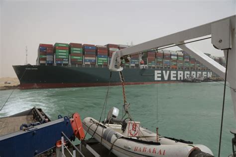 Suez Canal crisis cargo vessel now legally grounded amid compensation ...