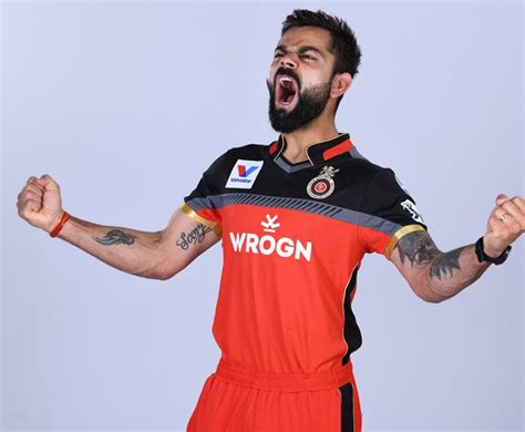 PHOTOS: Kohli, AB unveil RCB's jersey for IPL 12 - Rediff Cricket