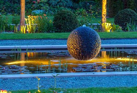 Stone Sphere Water Feature | Water Fountain Ball of Black Pebbles