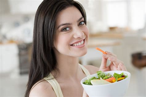 Woman Eating Vegetables