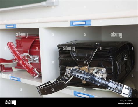 Schoolchild's satchel in classroom Stock Photo - Alamy