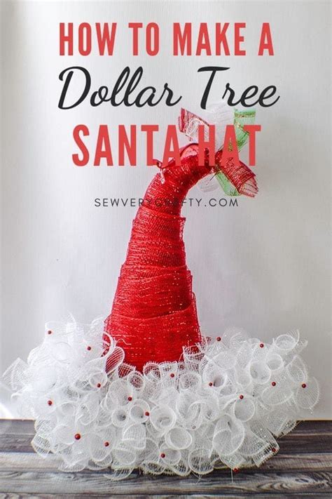 a santa hat made out of yarn on top of a white sign that says how to make a dollar tree santahat