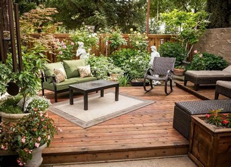 Lining a deck or patio with lush container garden creates a sense of privacy Small Backyard ...