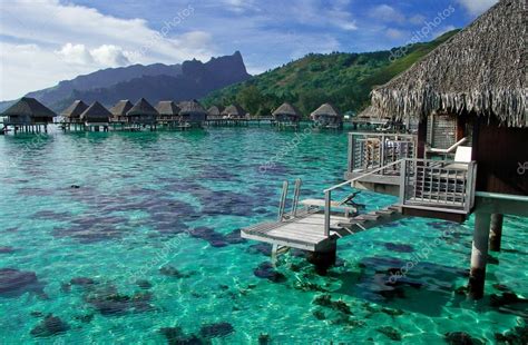 Overwater bungalows in French Polynesia Stock Photo by ©ncousla 29481129