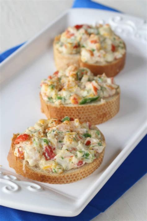 Simple recipe for hot seafood appetizers with tomatoes, greens, crab ...