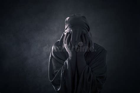 Scary Figure in Hooded Cloak Stock Image - Image of evil, black: 138989565