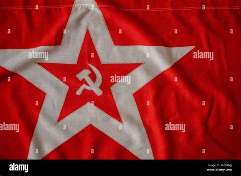 Red hammer and sickle flag, symbol for the communist movement Stock Photo - Alamy