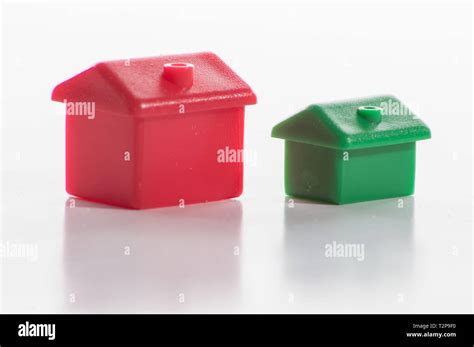 Monopoly board game pieces Stock Photo - Alamy