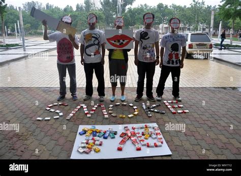 Dressed up students stage a campaign marking the World No Tobacco Day ...