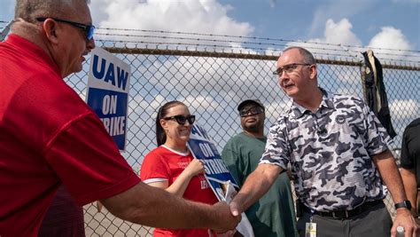 UAW President Fain compared to Reuther while running multiple strikes