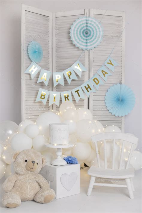 Photo zone with decor for kids happy birthday party with balloons, paper garlands and toys Stock ...