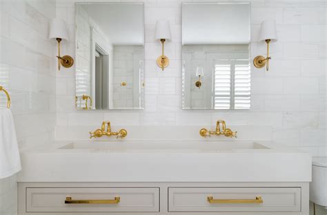 white vanity - sconces - brass hardware - brass fixtures - white ...