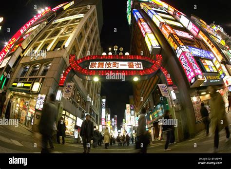 Crowd in Street at Night Stock Photo - Alamy