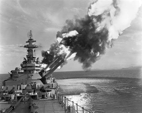 Battleship New Jersey firing a six-gun salvo at an enemy troop concentration near Kaesong, Korea ...